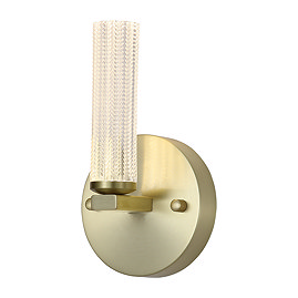 A modern wall‑mounted light with a round satin‑brass base and a short vertical cylinder of textured clear acrylic, glowing softly to show the light is switched on.
