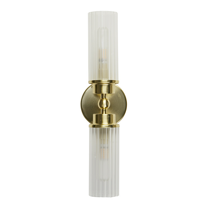 A satin brass up‑and‑down wall light featuring two clear ribbed glass shades, one pointing up and one down, shown switched off.