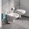 Grohe Bau Rimless Wall Hung Toilet with Soft Close Seat  In Bathroom Large Image