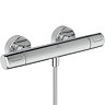 Angled-front view of the Ideal Standard Ceratherm T25 N Exposed Thermostatic Shower Mixer in chrome.
