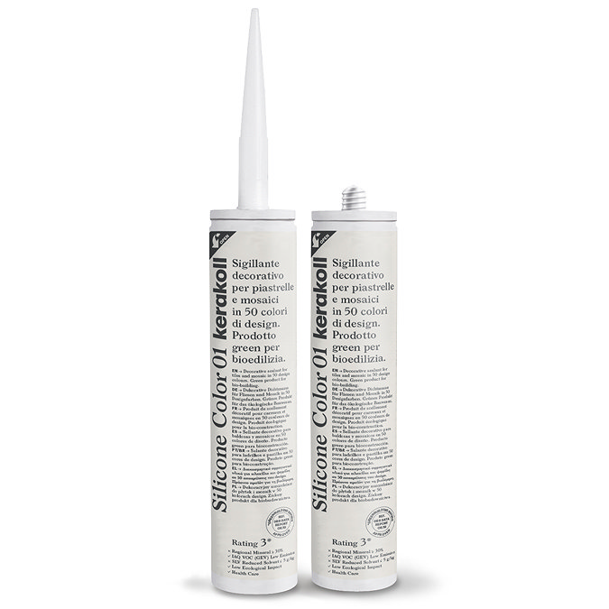 Two Kerakoll Silicone Color white sealant tubes standing upright, one with nozzle attached and one with cap.