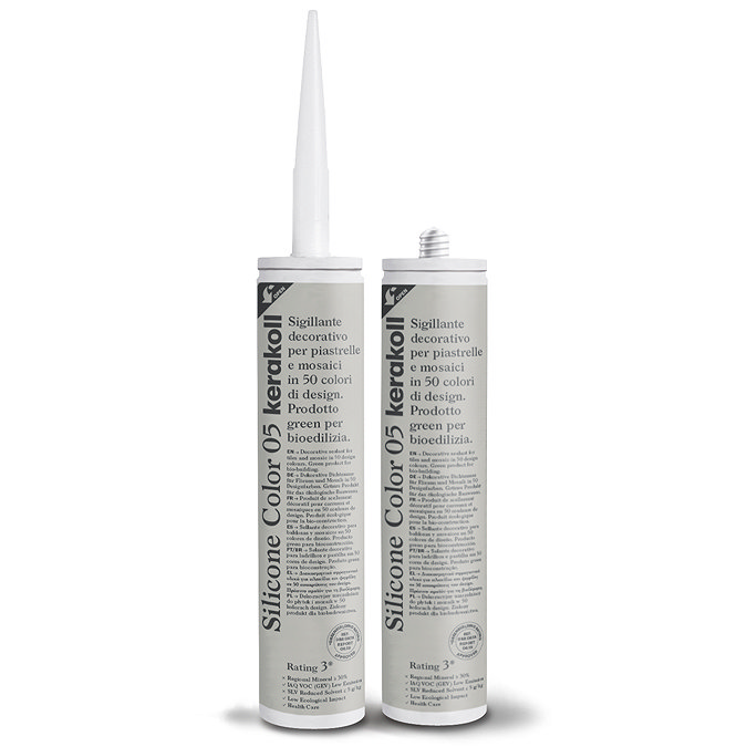 Two Kerakoll Silicone Color beige sealant tubes standing upright, one with nozzle attached and one with cap.