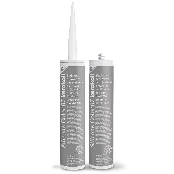 Two Kerakoll Silicone Color grey sealant tubes standing upright, one with nozzle attached and one with cap.