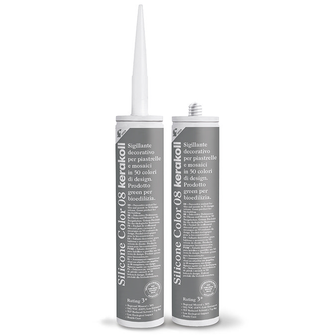 Two Kerakoll Silicone Color grey sealant tubes standing upright, one with nozzle attached and one with cap.