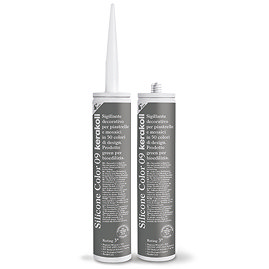 Two Kerakoll Silicone Color grey sealant tubes standing upright, one with nozzle attached and one with cap.