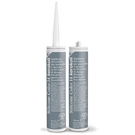Two Kerakoll Silicone Color blue sealant tubes standing upright, one with nozzle attached and one with cap.