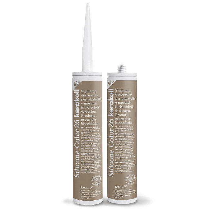 Two Kerakoll Silicone Color brown sealant tubes standing upright, one with nozzle attached and one with cap.