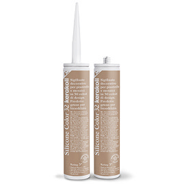 Two Kerakoll Silicone Color brown sealant tubes standing upright, one with nozzle attached and one with cap.