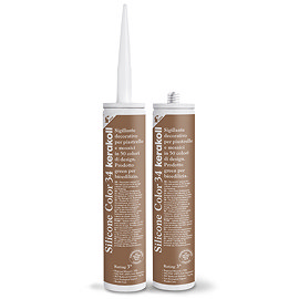 Two Kerakoll Silicone Color brown sealant tubes standing upright, one with nozzle attached and one with cap.