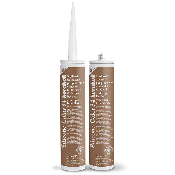 Two Kerakoll Silicone Color brown sealant tubes standing upright, one with nozzle attached and one with cap.
