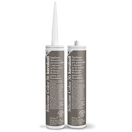 Two Kerakoll Silicone Color brown sealant tubes standing upright, one with nozzle attached and one with cap.