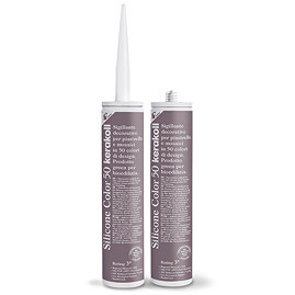 Two Kerakoll Silicone Color purple sealant tubes standing upright, one with nozzle attached and one with cap.