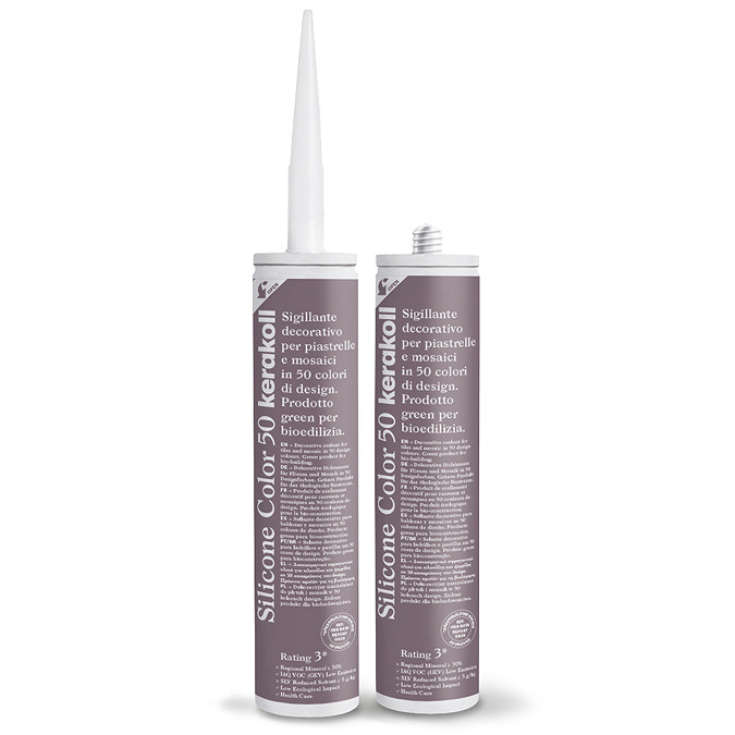 Two Kerakoll Silicone Color purple sealant tubes standing upright, one with nozzle attached and one with cap.