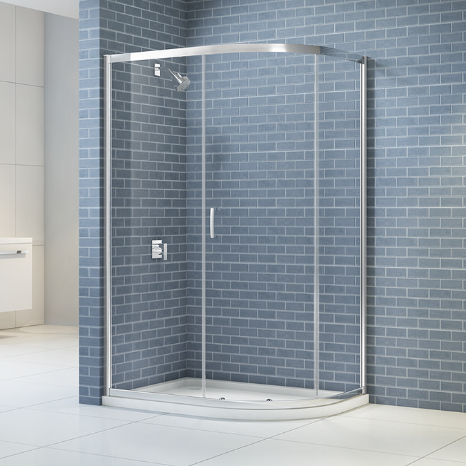 Merlyn IQ 1 door offset quadrant shower enclosure installed in a bathroom setting, featuring a chrome frame and clear glass panels.