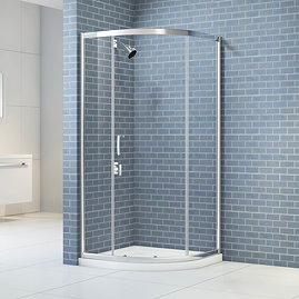 Merlyn IQ 1 door quadrant shower enclosure installed in a bathroom setting, featuring a chrome frame and clear glass panels.