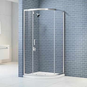 Close-up of Merlyn IQ shower enclosure wall profile and top frame, showing the slot-and-lock easy-fit frame system with no visible screws.