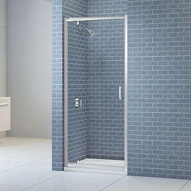Merlyn IQ pivot shower door installed in a bathroom setting, featuring a chrome frame and clear glass.