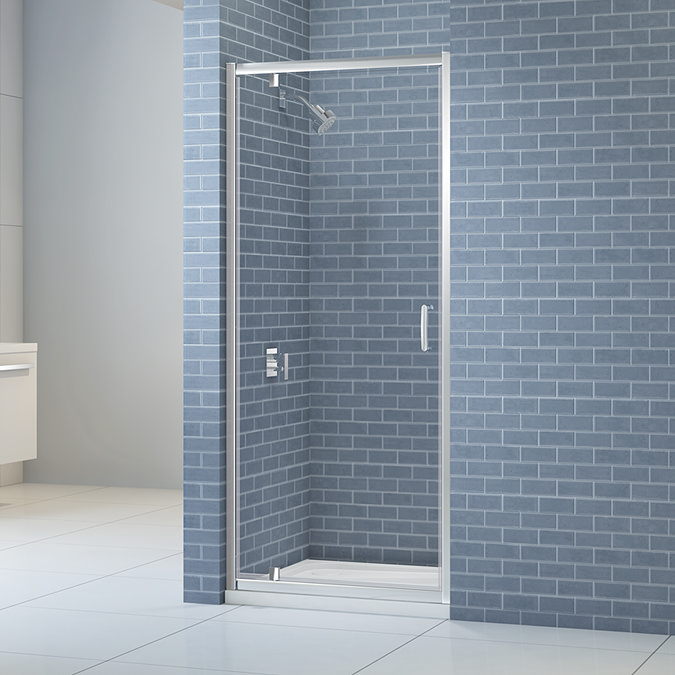 Merlyn IQ pivot shower door installed in a bathroom setting, featuring a chrome frame and clear glass.