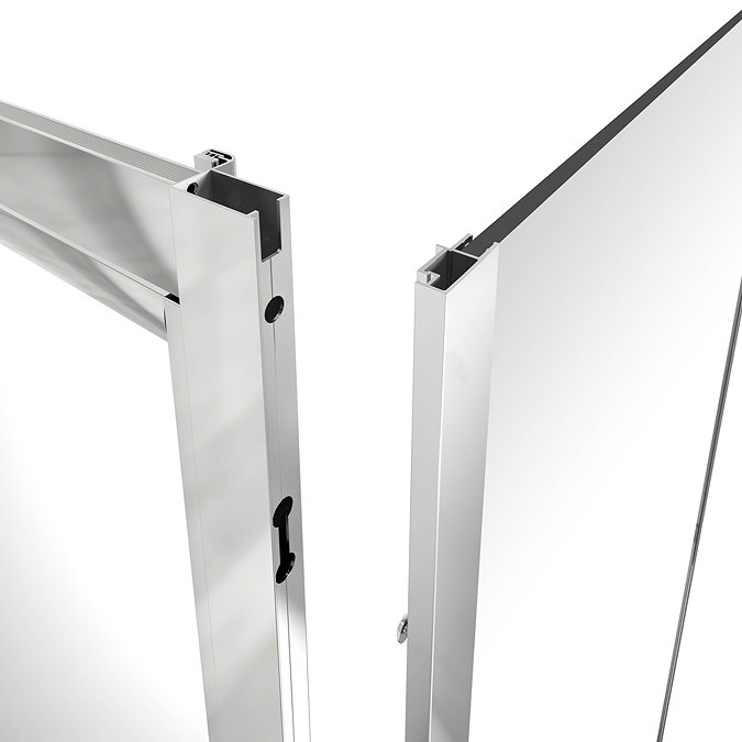 Close-up of Merlyn IQ shower side panel showing the chrome wall profile and glass panel connection, designed to integrate seamlessly with IQ shower enclosures and doors