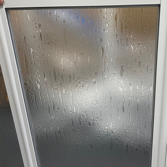 Milton White RH Front Access Half Height Bi-Fold Shower Door Hinged from Fixed Panel In Bathroom La