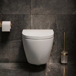 Pavilion Round Rimless Wall Hung Toilet with Soft-Close Seat, Brushed Brass Hinges Lifestyle Front