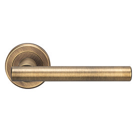 Revive Lago Round Door Lever Handles - Antique Brass Large Image