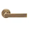 Revive Nino Round Door Lever Handles - Antique Brass Large Image