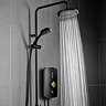 Triton Amala DuElec 9.5kW electric shower in brushed copper and black, showing the rainfall shower head in use with water flowing and the handheld shower mounted on the riser rail.