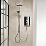 Triton Aspirante DuElec electric shower installed in a modern bathroom setting, showing the shower unit alongside the rainfall and handheld shower heads.