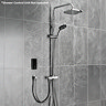 Triton DuoSwitch dual-outlet shower kit in chrome installed with a compatible electric shower unit shown for illustration; rainfall and handheld shower heads mounted on a rigid riser rail.