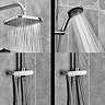 Close-up of the Triton DuoSwitch chrome rainfall shower head and handset in use, showing the positioning of the hose depending on if the shower head or handset is in use.
